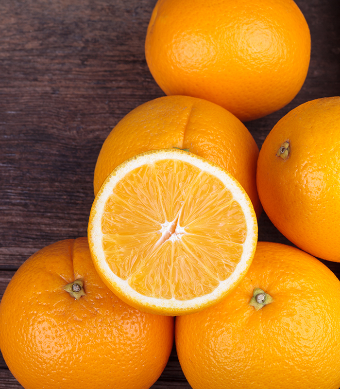 fresh orange on wooden